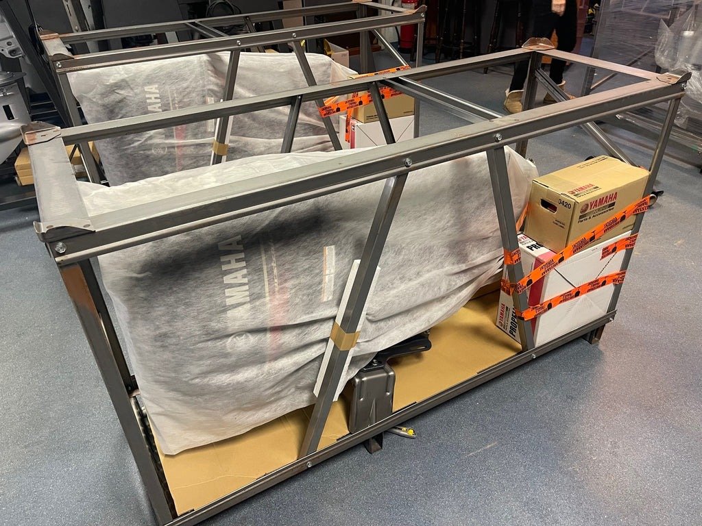 Japanese outboard motor securely packed in a wooden shipping crate ready for Australia-wide delivery from Japan Engine & Marine